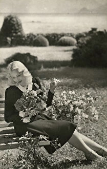Park Bench Collection: Portrait of a woman with a bouquet of roses