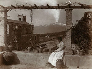 Images Dated 29th January 2009: Portrait of a woman near the convent of San Domenico in Taormina. Etna in the background