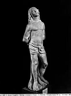 Statue representing St. Sebastian. Terracotta by an anonymous artist from the Tuscan sixteenth century preserved in the Church of S. Giovanni Evangelista at Montelupo, province of Florence