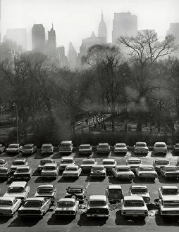 Images Dated 5th August 2011: View of the city of New York. A large parking lot is in the foreground