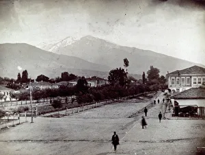 Prints of View of the town of Monastir, now Bitolj, or Bitola, in Macedonia. In the foreground an avenue, with a few pedestrians. In the background mount Peristeri. Date of Photograph:1865-1875 ca Macedonia Prints: View of the town of Monastir, now Bitolj