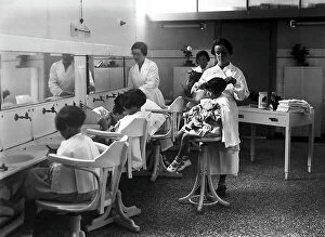 Images Dated 29th September 2014: Villa Rosa Maltoni Mussolini: young girls having their hair cut
