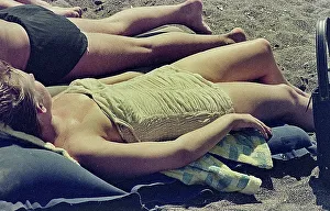 Woman In Swimsuit Prints: Woman in swimsuit sunbathing