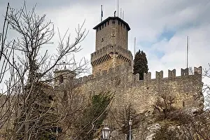 Prints of First tower or Fortress of Guaita is the oldest of the three towers constructed on Monte Titano, and the most famous. It was built in the 11th century. San Marino San Marino Prints: Print of the 11th-century Guaita Tower
