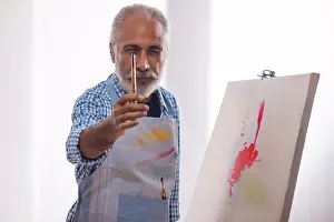 August Prints: Print of an Old Man Holding a Paintbrush