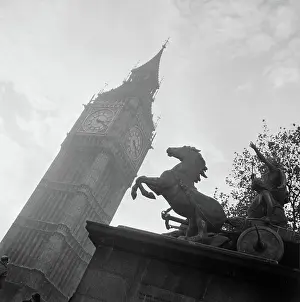 Prints of Poll photo collection. London in the fog. London. The bell tower of the Parliament Building (Big Ben) with the statue for Queen Baodicea in the foreground. undated. England, London, Westminster Westminster Prints: London Print: Big Ben and Queen Boudicca Statue