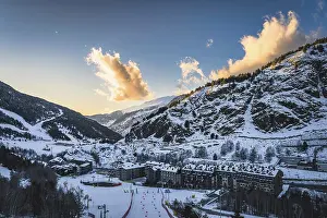 Prints of Bars, restaurants, hotels and residential building of El Tarter and Soldeu town at sunset. Ski winter holidays in Andorra, Pyrenees Mountains Andorra Prints: Print of El Tarter and Soldeu at Sunset, Andorra