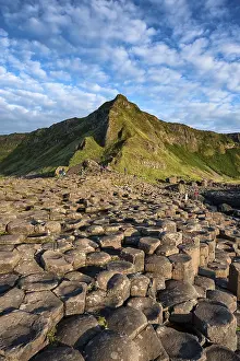 Northern Ireland Landscape Prints: Basalt columns by the coast at sunset