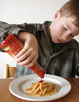 Child Eating Habits Prints: Boy eats chips