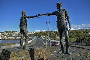 Prints of Bronze sculpture Hands Across the Divide by Maurice Harron at the Craigavon Bridge over the River Foyle, Monument of Reconciliation, Derry-Londonderry, Ulster Province, Northern Ireland, Great Britain County Armagh Prints: Hands Across the Divide Bronze Sculpture Print, Derry-Londonderry, Northern Ireland