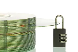 Confidentiality Measures Prints: CD stack with a CD and a padlock