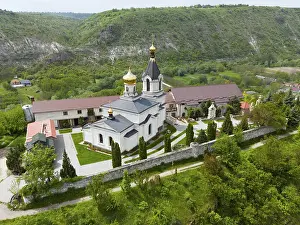 Prints of A church with gold domes surrounded by green hills seen from a bird's eye view, St Moldova Prints: Print of St. Mary's Church, Butuceni, Republic of Moldova