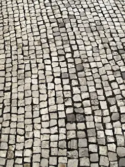 European Street Scene Prints: A cobblestone texture image