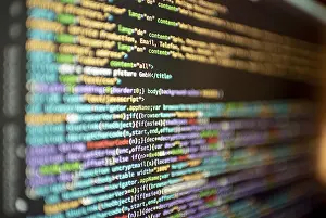 Computer Hacking Risks Prints: Computer html code on screen