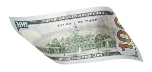 Studio Shot Image Prints: One hundred dollar bill falling or floating on empty background