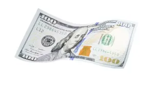 US Dollar Note Prints: One hundred dollar bill falling or floating on empty background
