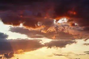 Dramatic Cloud Sky Prints: Dramatic cloud sky at sunset, orange