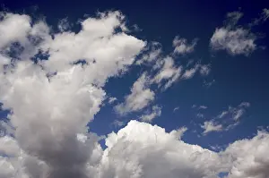 Atmospheric Landscape Prints: Dramatic clouds on a deep blue sky