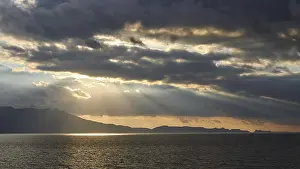 Dramatic Cloudy Skies Prints: Dramatic cloudy evening sky, sun rays breaking through clouds