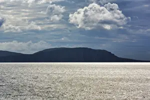 Overcast Sky Landscape Photo Prints: Dramatic cloudy sky over cliffs
