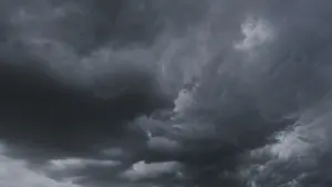 Dark Storm Clouds Prints: Dramatic dark storm clouds in sky background