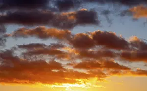 Dramatic Evening Sky Prints: Dramatic evening sky with clouds at sunset
