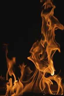 Dark Background Flames Prints: Dramatic flames against A dark background