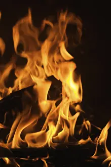 Dark Background Flames Prints: Dramatic flames against A dark background