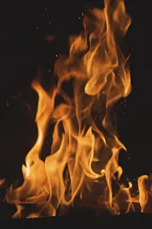 Dark Background Flames Prints: Dramatic flames against A dark background