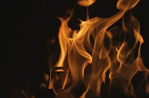 Plain Colored Background Wallpaper Prints: Dramatic flames against A dark background