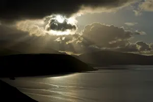 Deserted Coastline View Prints: Dramatic light mood, cloudy sky