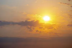 Etosha National Park Namibia Prints: Dramatic sunset with clouds and sun