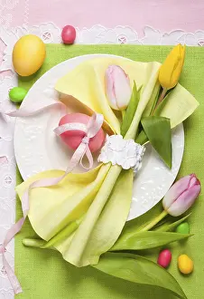 Spring Blooming Flowers Prints: Easter table setting with tulips and easter eggs