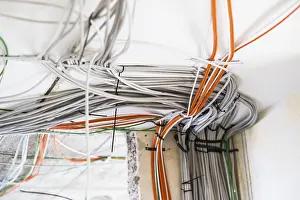 Electrical Power Supply Line Prints: Electric cable on the ceiling of a flat