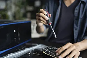 Hardware Installation Prints: IT Engineer installing Hardware Equipment Development Facility Engineer Maintenance computer Motherboard Electronic