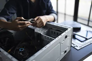 Framed Print : IT Engineer Installing Motherboard Print Framed Print : IT Engineer Installing Motherboard Print