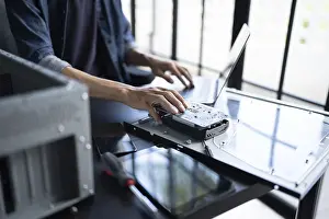 Computer Hardware Repair Prints: IT Engineer installing Hardware Equipment Development Facility Engineer Maintenance computer Motherboard Electronic