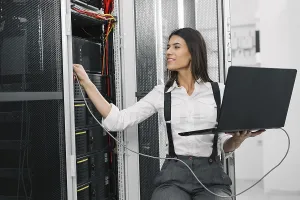Computer Hacking Prints: IT expert checking supercomputer server