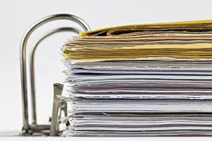 Empty File Folders Prints: A file folder with documents and papers