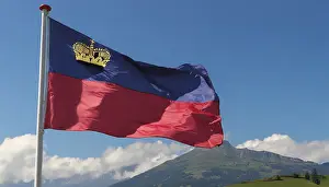 Prints of The flag of Liechtenstein flutters in the wind Liechtenstein Prints: The Flag of Liechtenstein Print