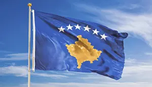 Prints of Flags, the national flag of Kosovo flutters in the wind Kosovo Prints: Kosovo National Flag Print