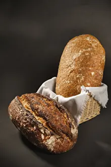 Bakery Products Isolated Prints: Fresh bread on a dark background