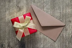 Office Supply Storage Prints: Gift or present box and envelope on the table