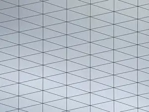 Black And White Geometry Prints: A gray surface featuring a modern geometric pattern composed of interconnected triangles