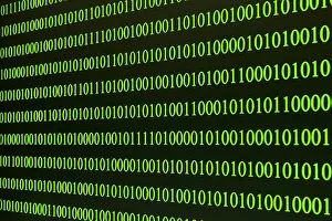 Green Binary Code Prints: Green binary code arranged in rows on a black background