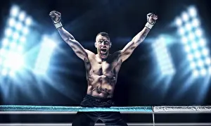 Kickboxing Champion Prints: Kickboxer posing in the ring