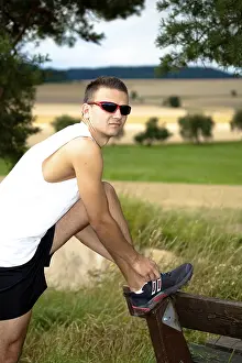 Athletic Male Runner Prints: Man jogging through the fields