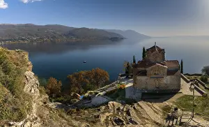 Prints of Ohrid, North Macedonia, 1 November, 2022: view of the church of Saint John and Lake Ohrid in North Macedonia North Macedonia Prints: Ohrid, North Macedonia Print: Saint John Church and Lake Ohrid