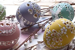 Traditional Easter Decorations Prints: Painted easter egg with cut out patterns