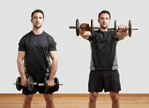 Sport Prints: Personal Trainer doing front dumbbell raises Print